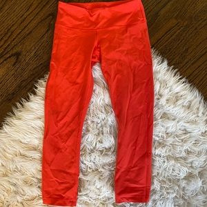 LULULEMON reddish orange cropped leggings, size 4
